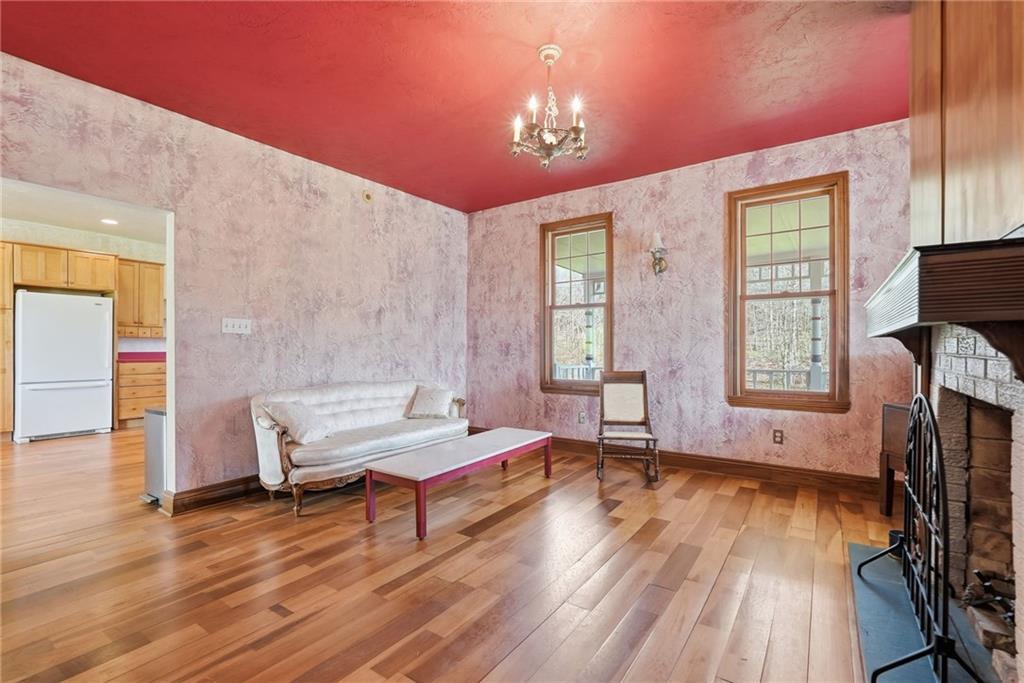 20 Walker Road Burgettstown, PA 15021 - Photo 29 of 50 a living room with furniture and a wooden floor