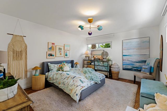 a view of a livingroom with furniture and workspace