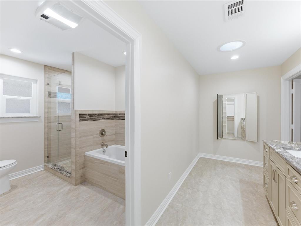 3717 Myrtle Springs Road Benbrook, TX 76116 - Photo 31 of 40 Separate shower and soaking tub in primary bath.