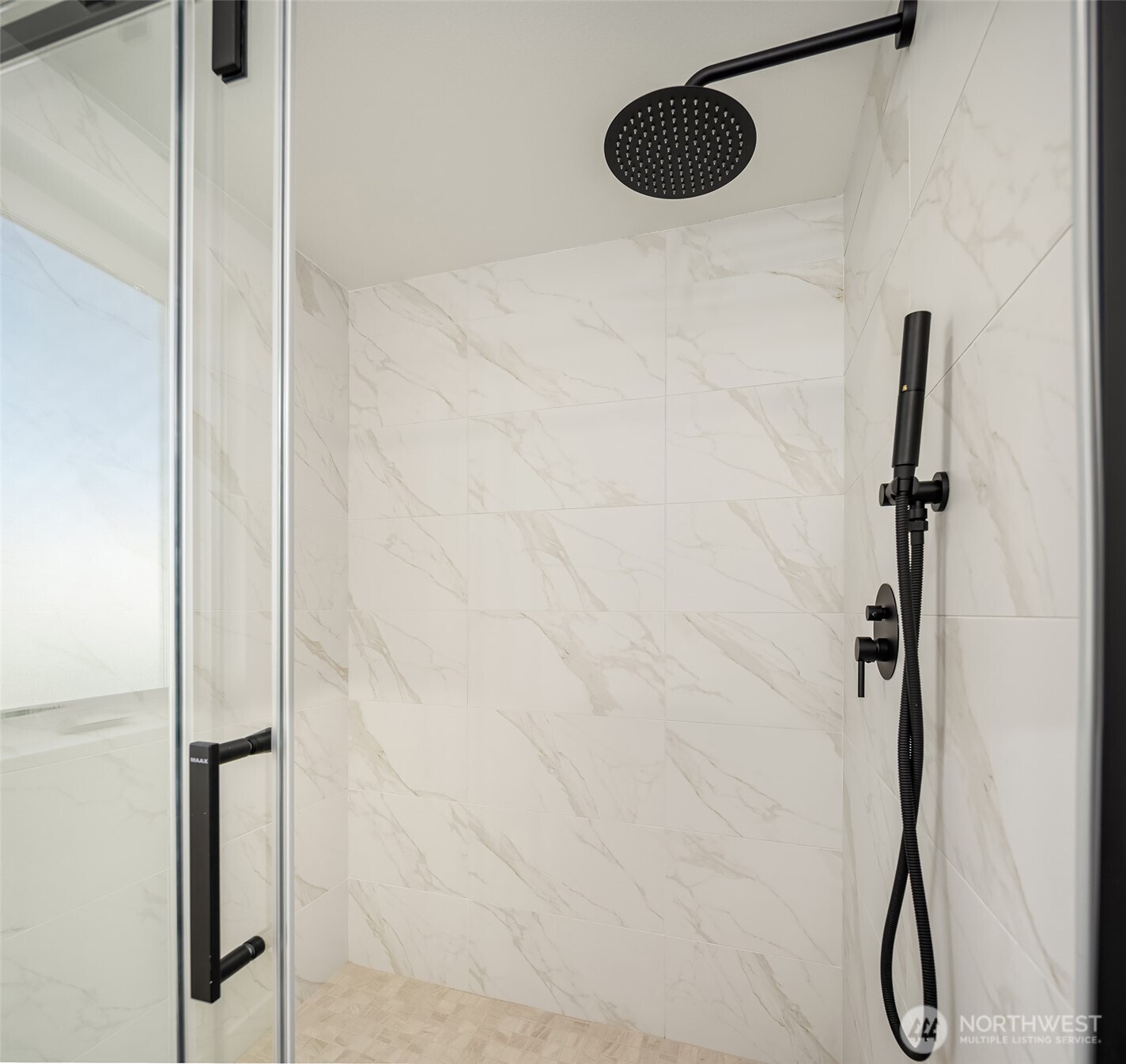 3444 Northwest 65th Street Seattle, WA 98117 - Photo 19 of 38 a bathroom with a shower