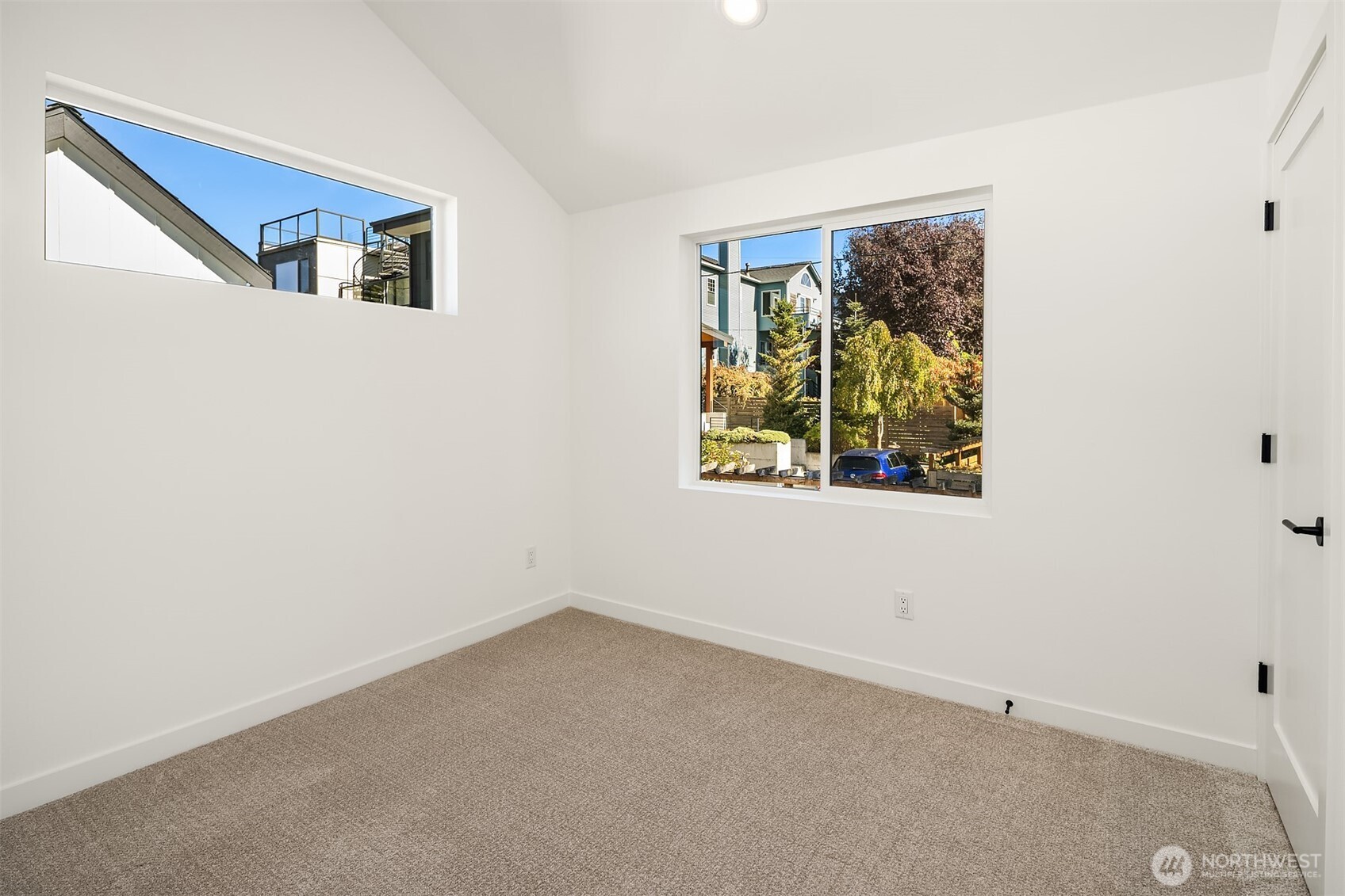3444 Northwest 65th Street Seattle, WA 98117 - Photo 21 of 38 an empty room with windows