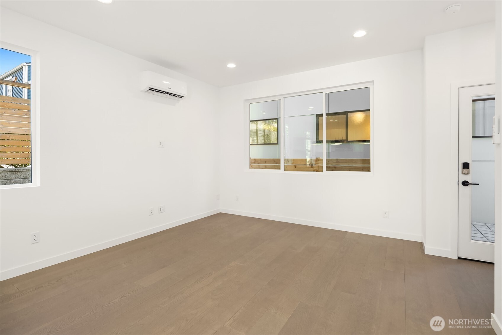 3444 Northwest 65th Street Seattle, WA 98117 - Photo 7 of 38 an empty room with windows