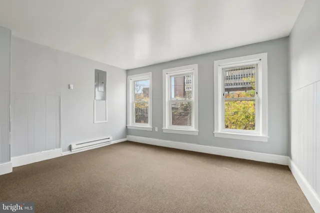 an empty room with windows