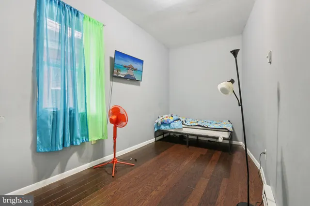 a bedroom with a bed and a closet