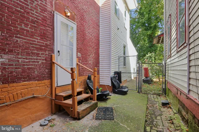 a view of a house with a tree