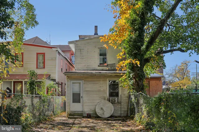 a picture of a wall with white wall painting