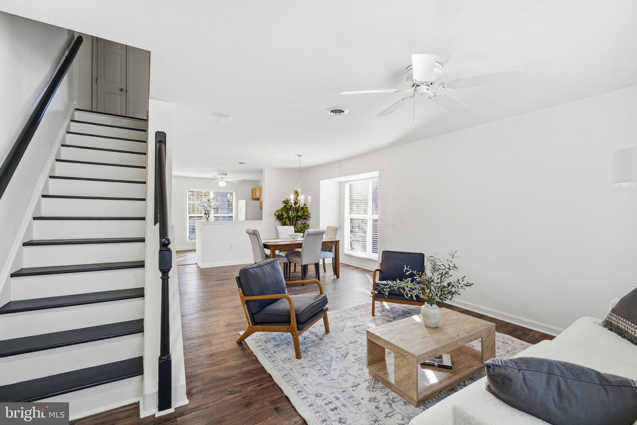 21103 Striper Run Rock Hall, MD 21661 - Photo 4 of 20 a living room with furniture and wooden floor