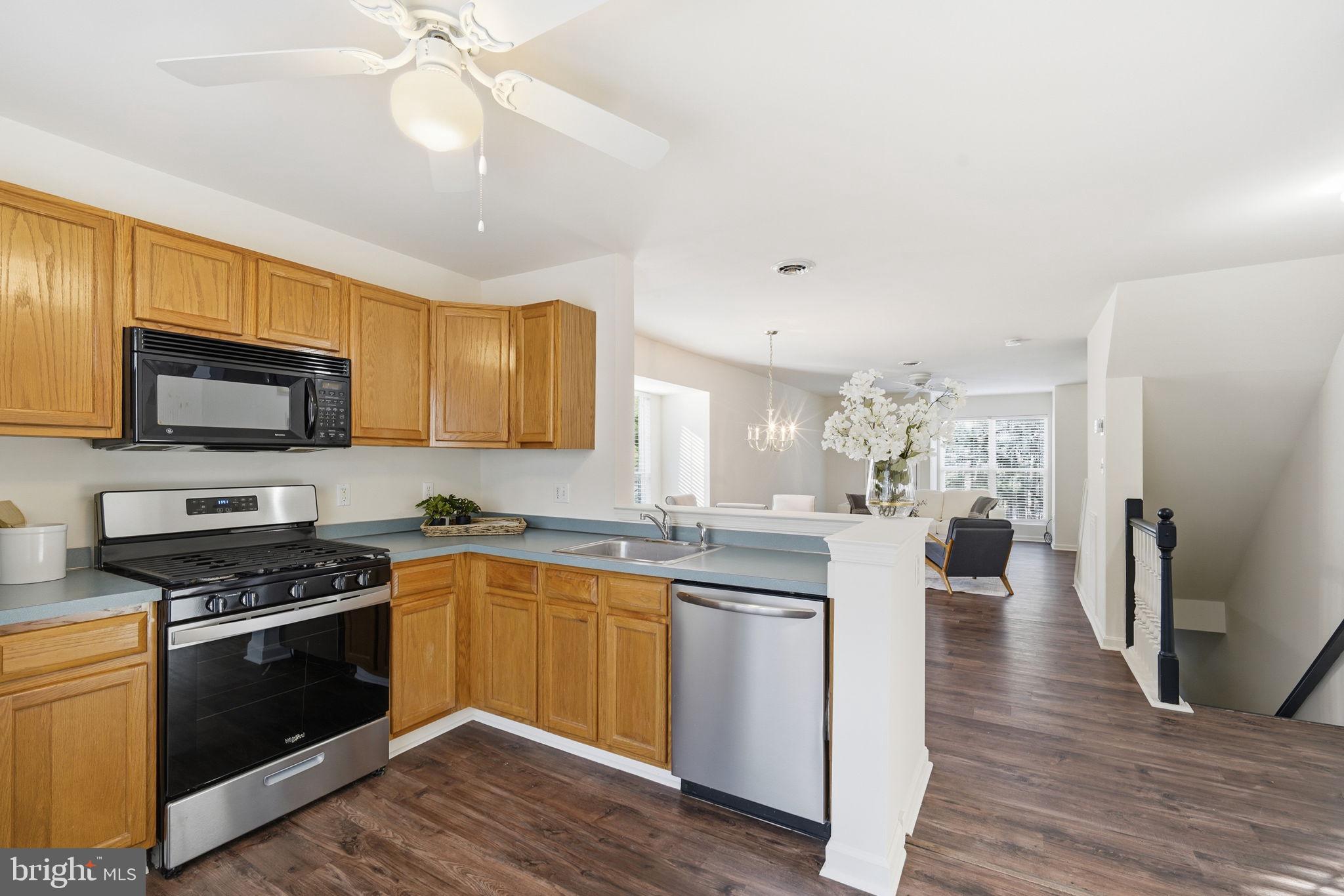 21103 Striper Run Rock Hall, MD 21661 - Photo 5 of 20 a kitchen with counter top space and stainless steel appliances