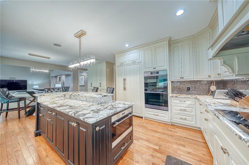 815 Mt Pleasant Road Mars, PA 16046 - Photo 15 of 42 Custom maple cabinets with Edgar Berebi knobs and pulls, Top-of-the-line appliances, Wolf Sub-Zero, Wolf Induction Cooktop, Dacor double oven w/steamer, 2 Bosch dishwashers, Wolf Speed Oven/Microwave. Hardwood floors, large pantry, sliding door to covered back patio