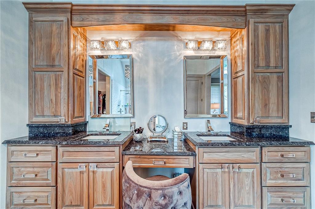 815 Mt Pleasant Road Mars, PA 16046 - Photo 22 of 42 Primary bathroom updated with custom maple cabinets, dual rain head shower system, heated floor. Enchanted glass custom inserts in primary bath windows.