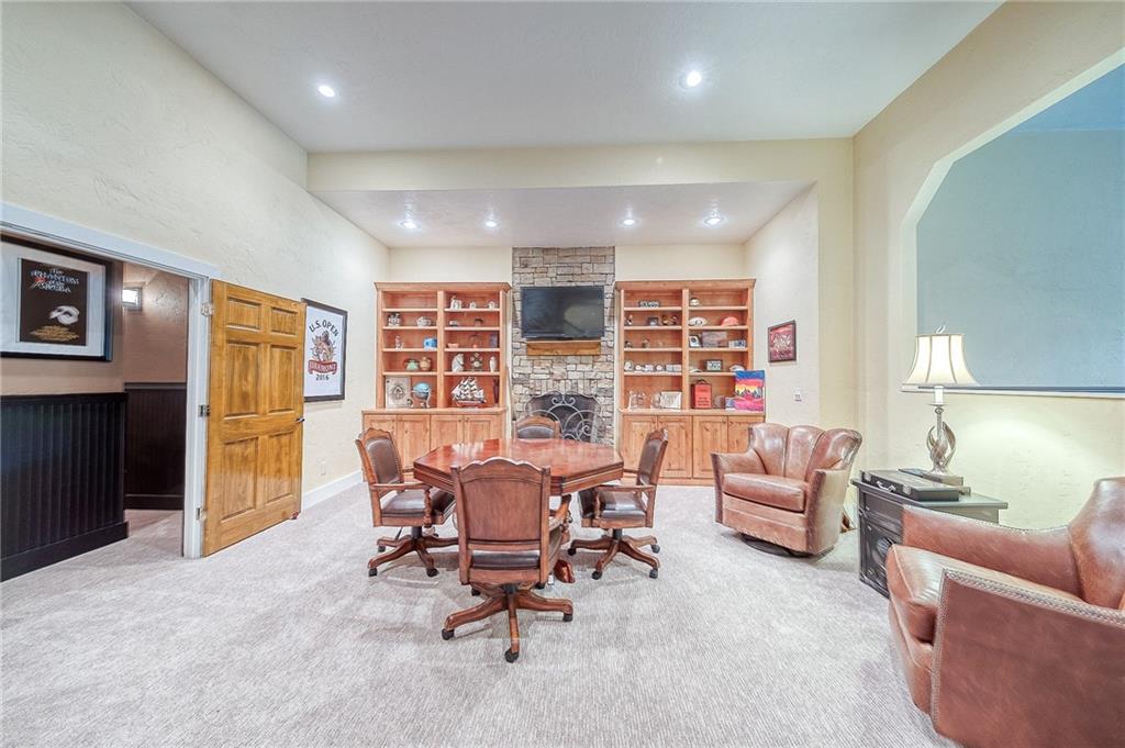 815 Mt Pleasant Road Mars, PA 16046 - Photo 25 of 42 Built in bookcases beside stone gas fireplace