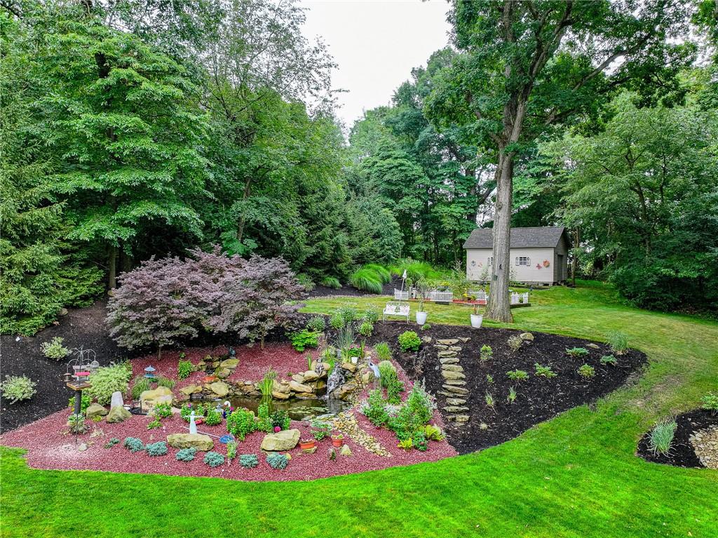 815 Mt Pleasant Road Mars, PA 16046 - Photo 5 of 42 Water fall, butterfly garden and shed in rear of yard