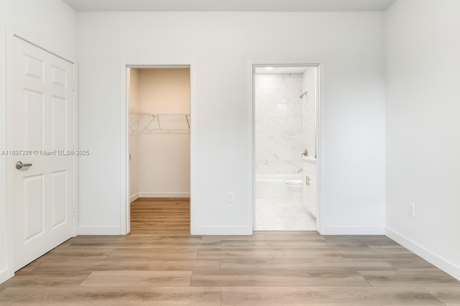 432 21st Street, Unit 432 West Palm Beach, FL 33407 - Photo 11 of 14 a view of a bathroom with wooden floor