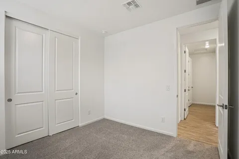 a view of a bathroom from the hallway