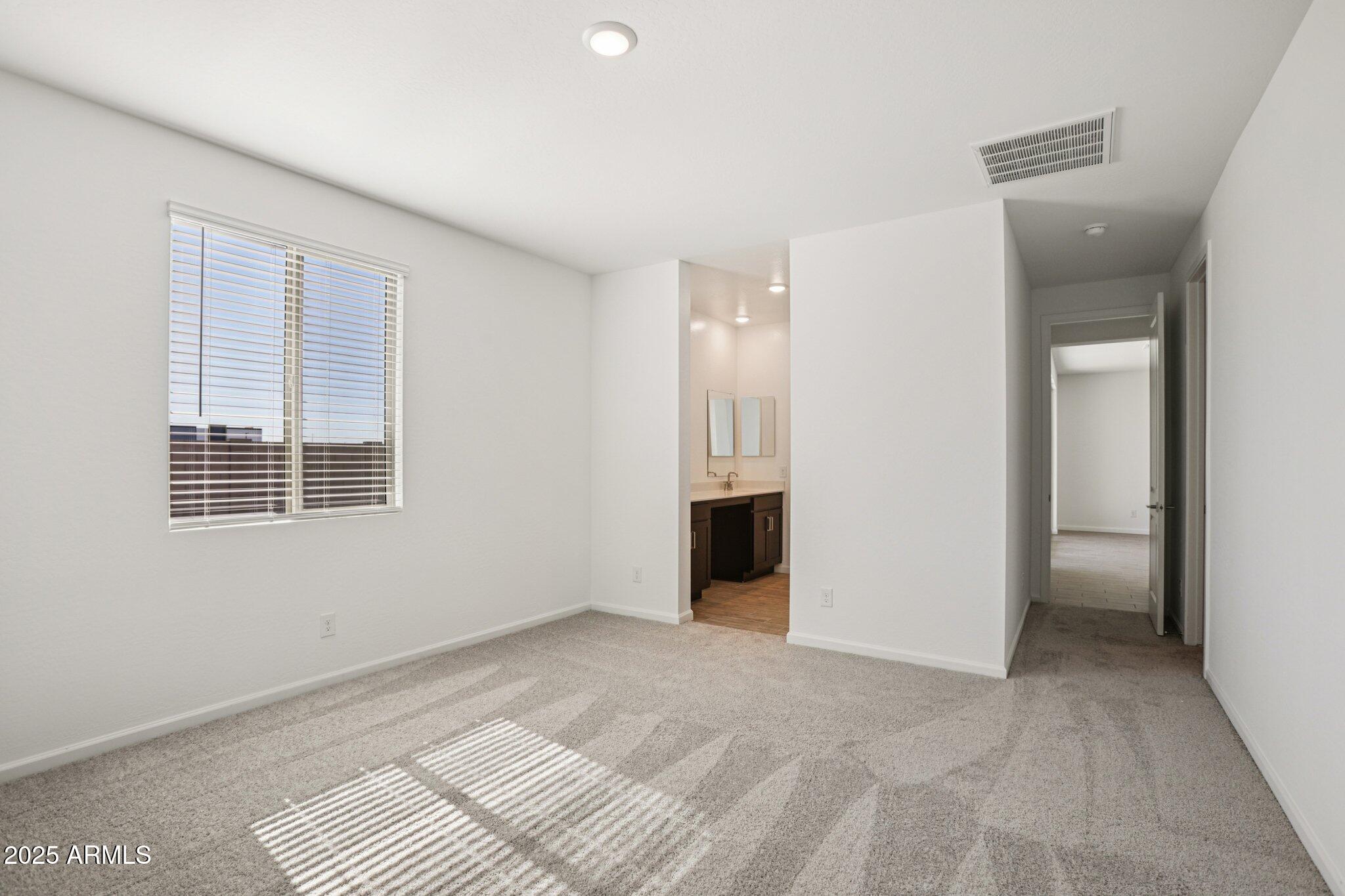 15723 West Brown Street Waddell, AZ 85355 - Photo 24 of 51 a view of an empty room with a window
