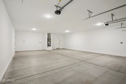 a view of a swimming pool and an outdoor seating