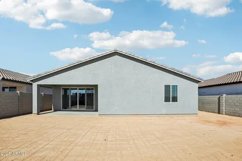 a view of a swimming pool with a lounge chairs