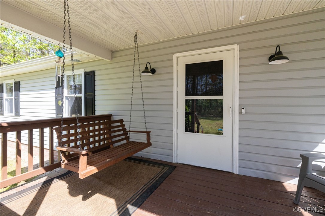 170 Faucetts Road Tappahannock, VA 22560 - Photo 15 of 48 a view of a porch with wooden floor