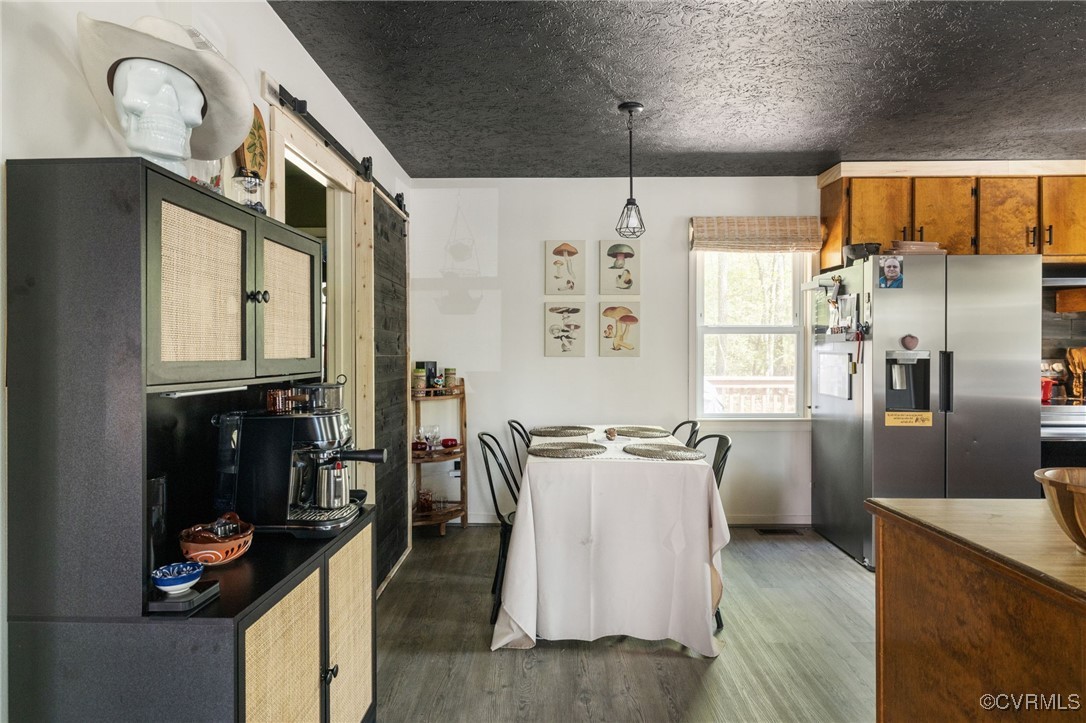 170 Faucetts Road Tappahannock, VA 22560 - Photo 24 of 48 a kitchen with stainless steel appliances granite countertop a refrigerator and a stove
