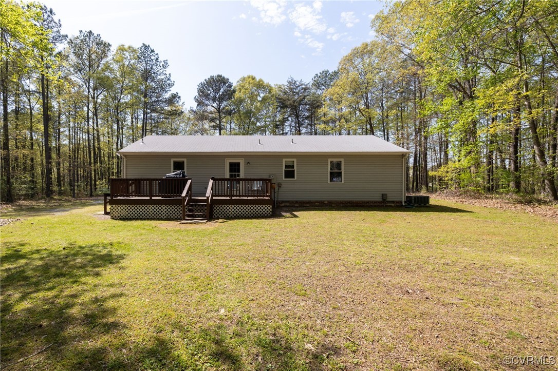 170 Faucetts Road Tappahannock, VA 22560 - Photo 47 of 48 a front view of a house with a yard