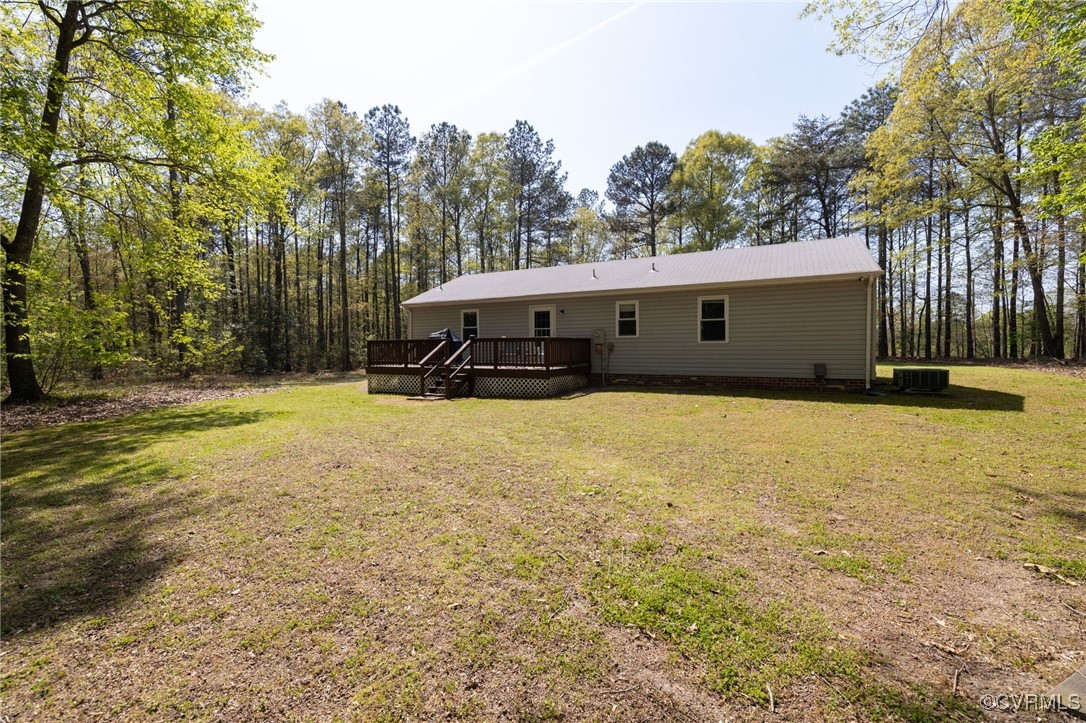 170 Faucetts Road Tappahannock, VA 22560 - Photo 48 of 48 a view of a house with a yard