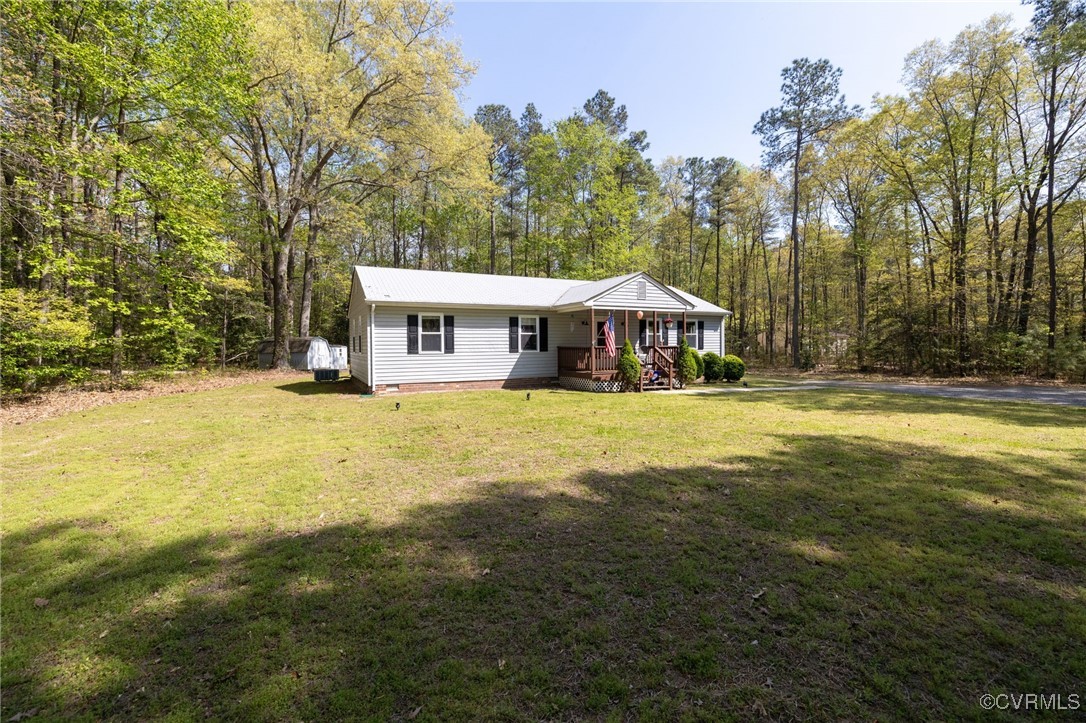 170 Faucetts Road Tappahannock, VA 22560 - Photo 9 of 48 a view of house with a swimming pool
