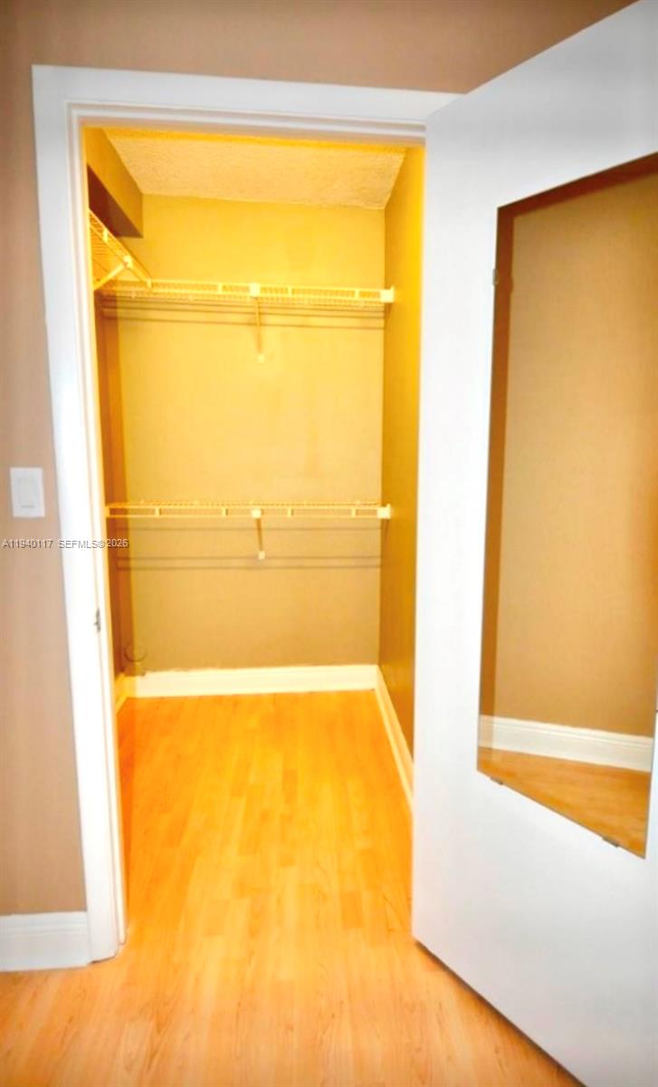 5654 Rock Island Road, Unit 214 Tamarac, FL 33319 - Photo 13 of 26 a bathroom with a tub