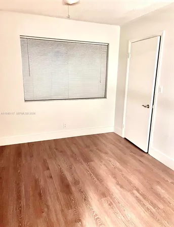 a kitchen with a sink and a window