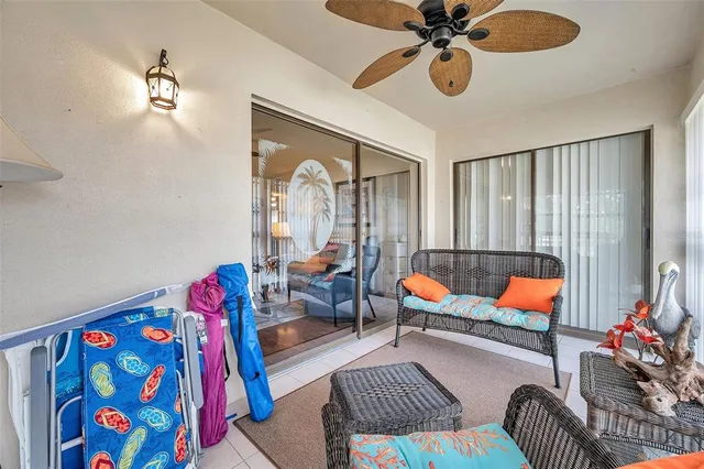 a bedroom with furniture and a rug