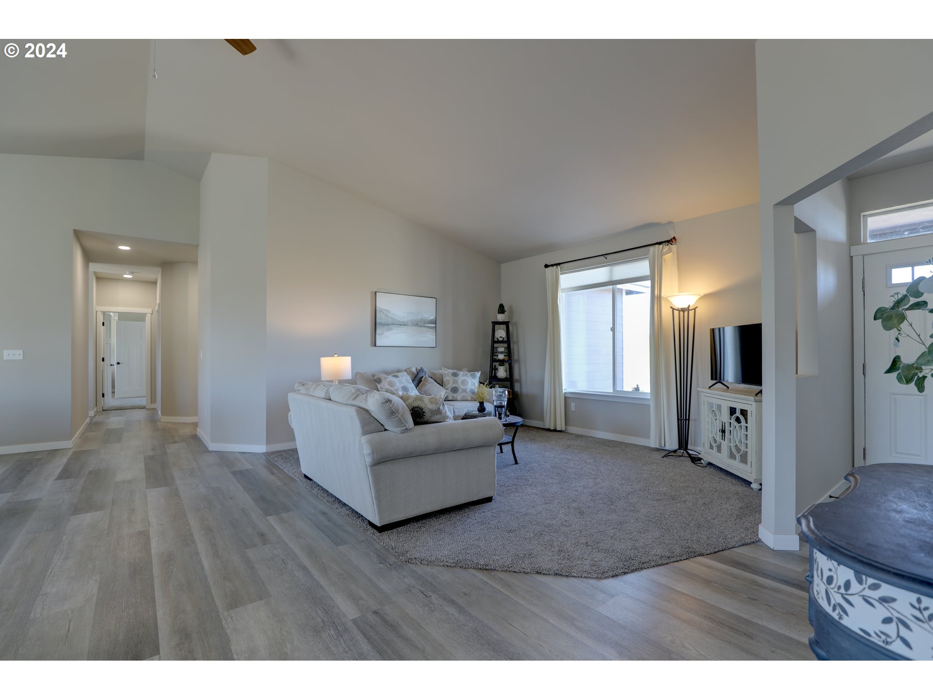 700 Dooley Road Centerville, WA 98613 - Photo 15 of 47 a living room with furniture and a wooden floor