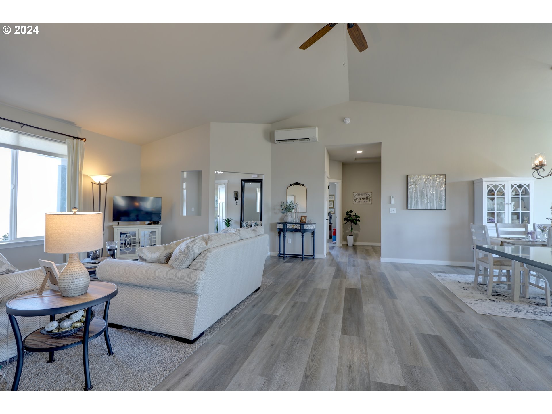 700 Dooley Road Centerville, WA 98613 - Photo 17 of 47 a living room with furniture and a wooden floor