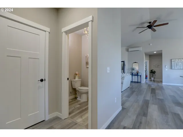 a view of a bathroom from the hallway