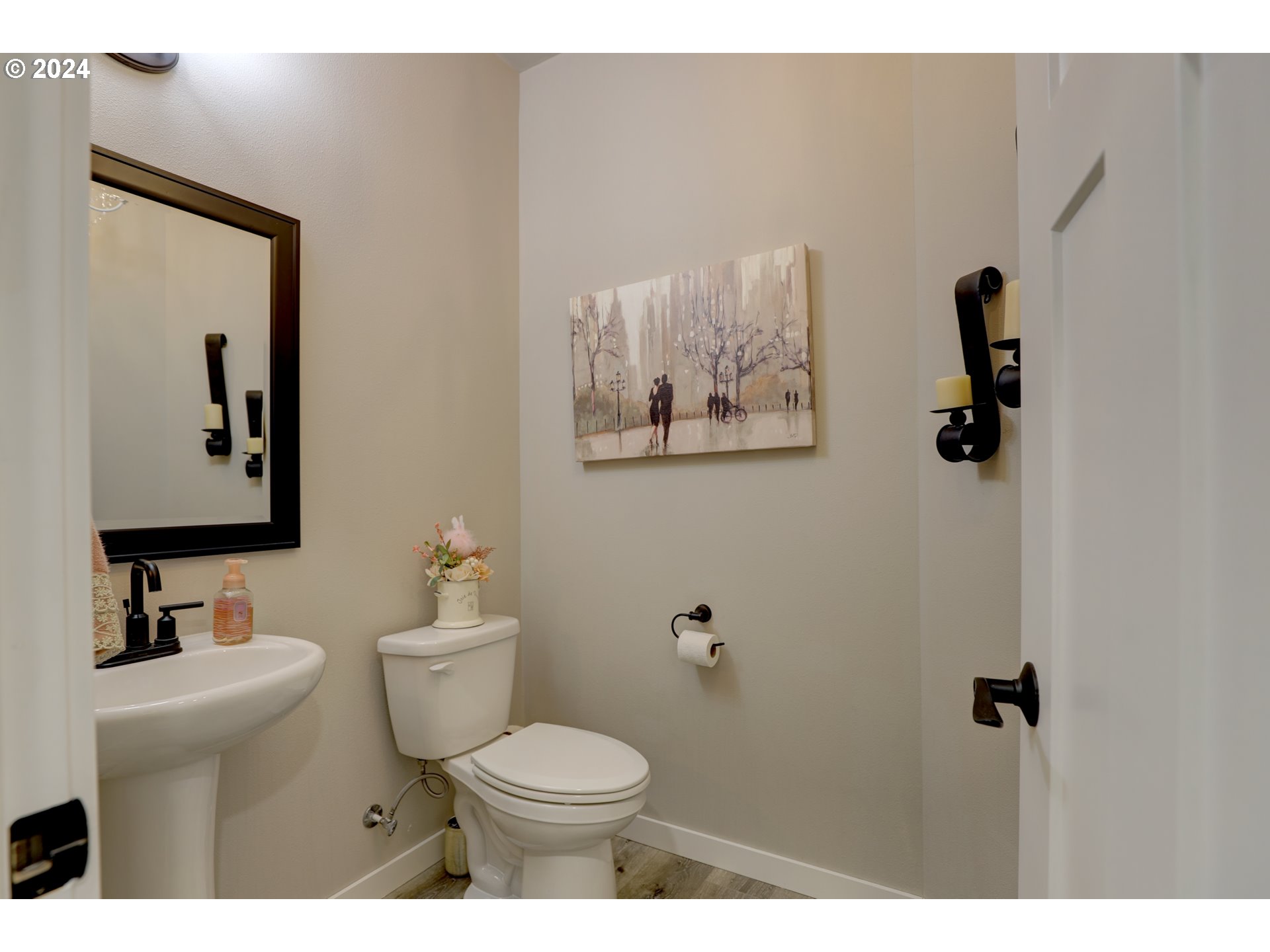 700 Dooley Road Centerville, WA 98613 - Photo 26 of 47 a bathroom with a toilet sink and mirror