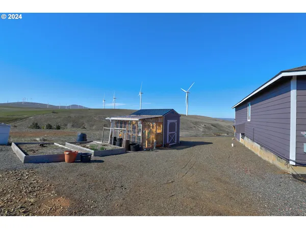 a view of a big house with a big yard