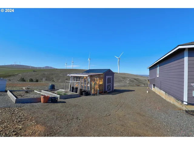 a view of a big house with a big yard