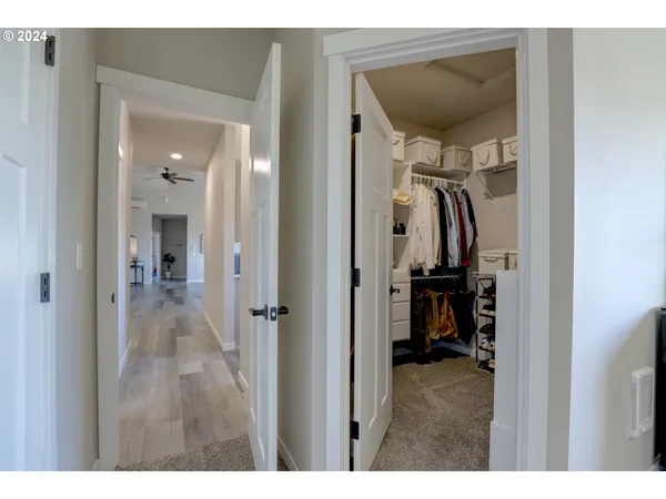 a bedroom with a bed and a view of bathroom