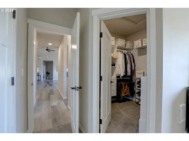 a bedroom with a bed and a view of bathroom