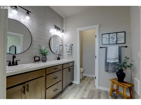 a bathroom with a sink and mirror