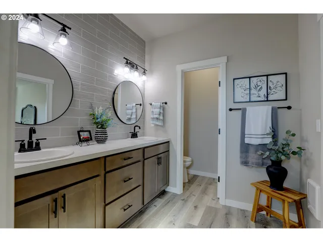 a bathroom with a sink and mirror