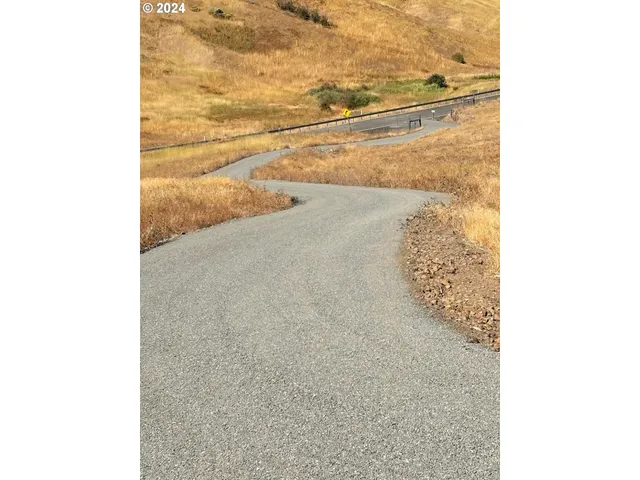 a living room with furniture and a garden
