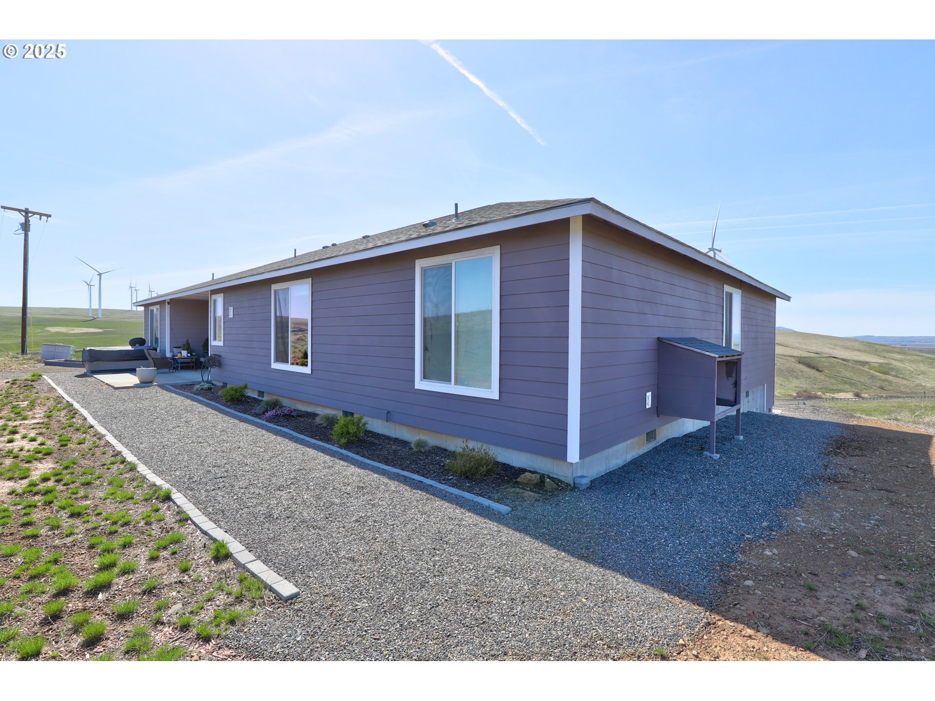 700 Dooley Road Centerville, WA 98613 - Photo 42 of 47 a view of a house with a yard