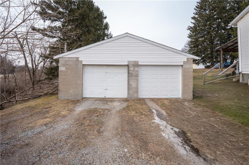 105 Pandora Road Loyalhanna, PA 15661 - Photo 20 of 27 a view of garage yard and garage