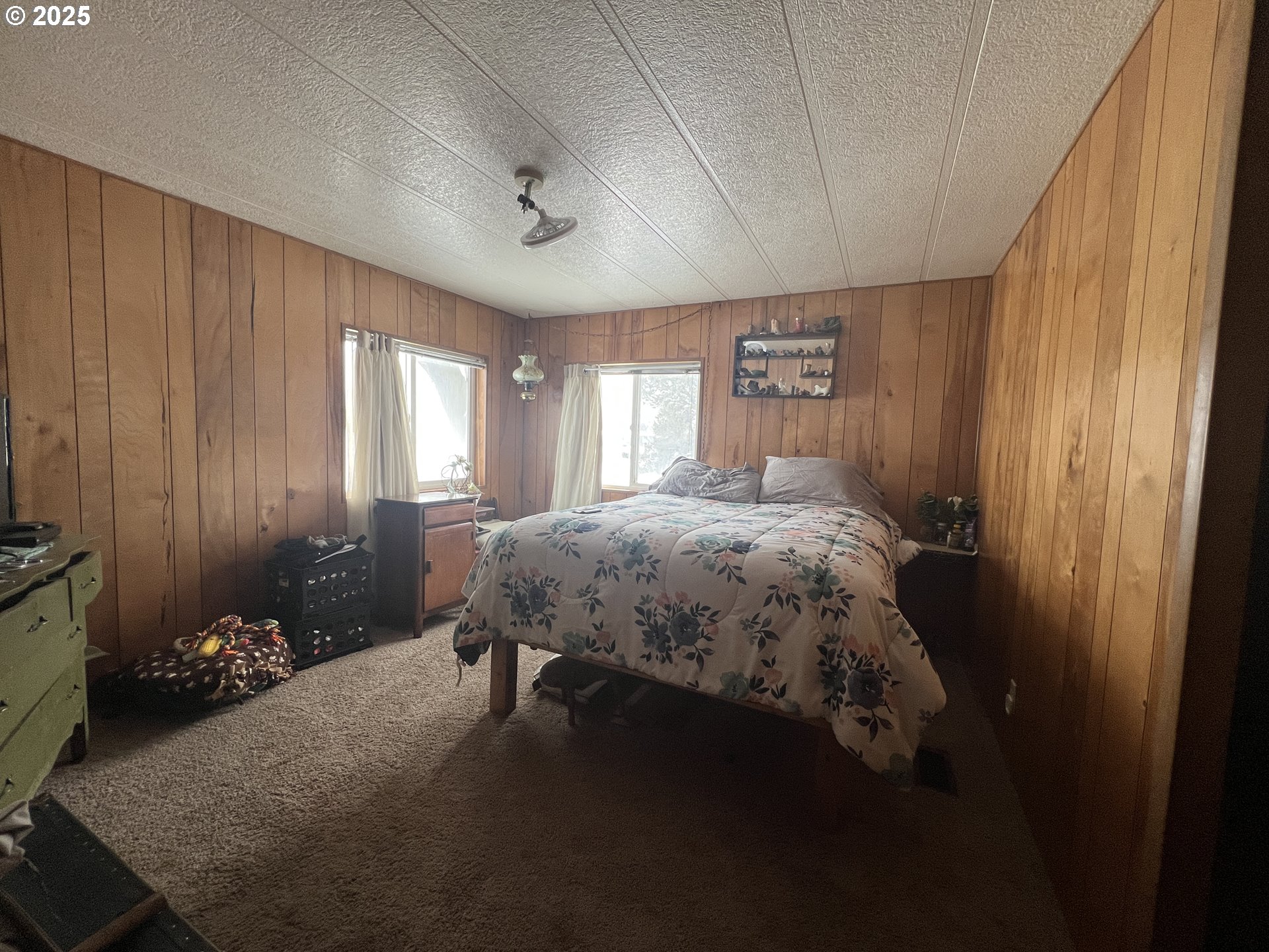 32726 East Punkin Center Road Hermiston, OR 97838 - Photo 13 of 17 a bedroom with a bed dresser and a window