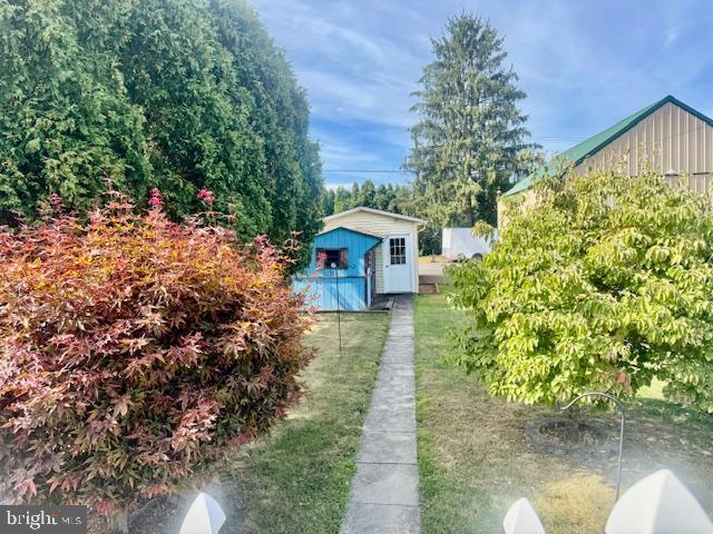 505 McKnight Street Gordon, PA 17921 - Photo 19 of 46 a front view of a house with a yard