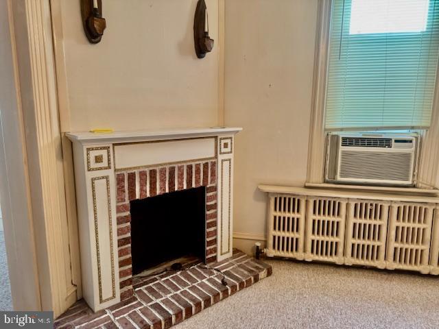 505 McKnight Street Gordon, PA 17921 - Photo 20 of 46 a living room with a fireplace and a wooden floor