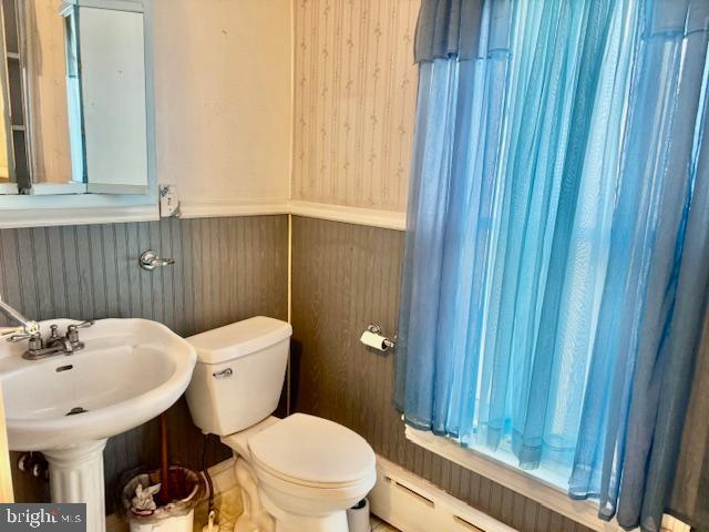 505 McKnight Street Gordon, PA 17921 - Photo 35 of 46 a bathroom with a sink a toilet and shower curtain