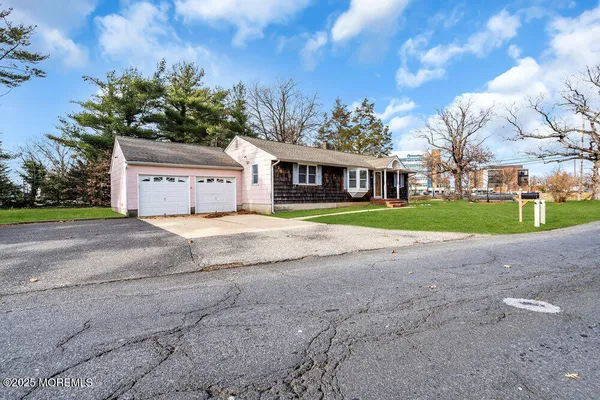 a house with yard in front of it