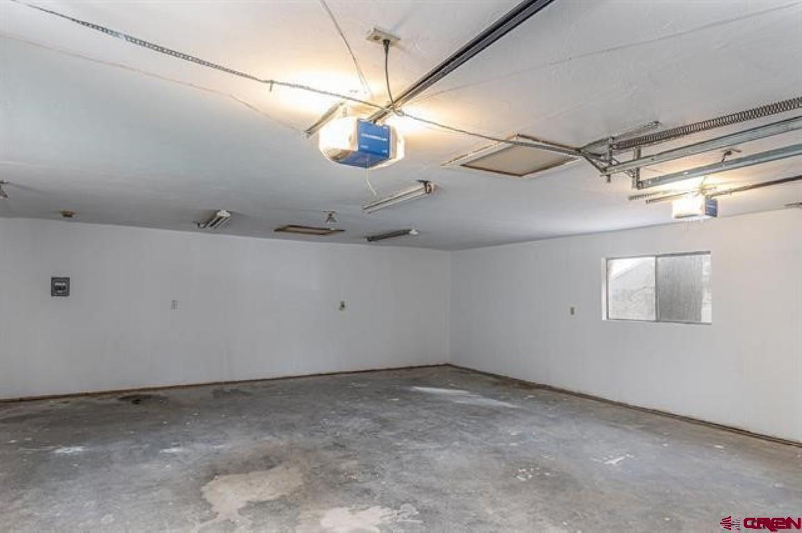 32 Hidden Lane Durango, CO 81303 - Photo 11 of 26 a view of a room with a ceiling fan and window