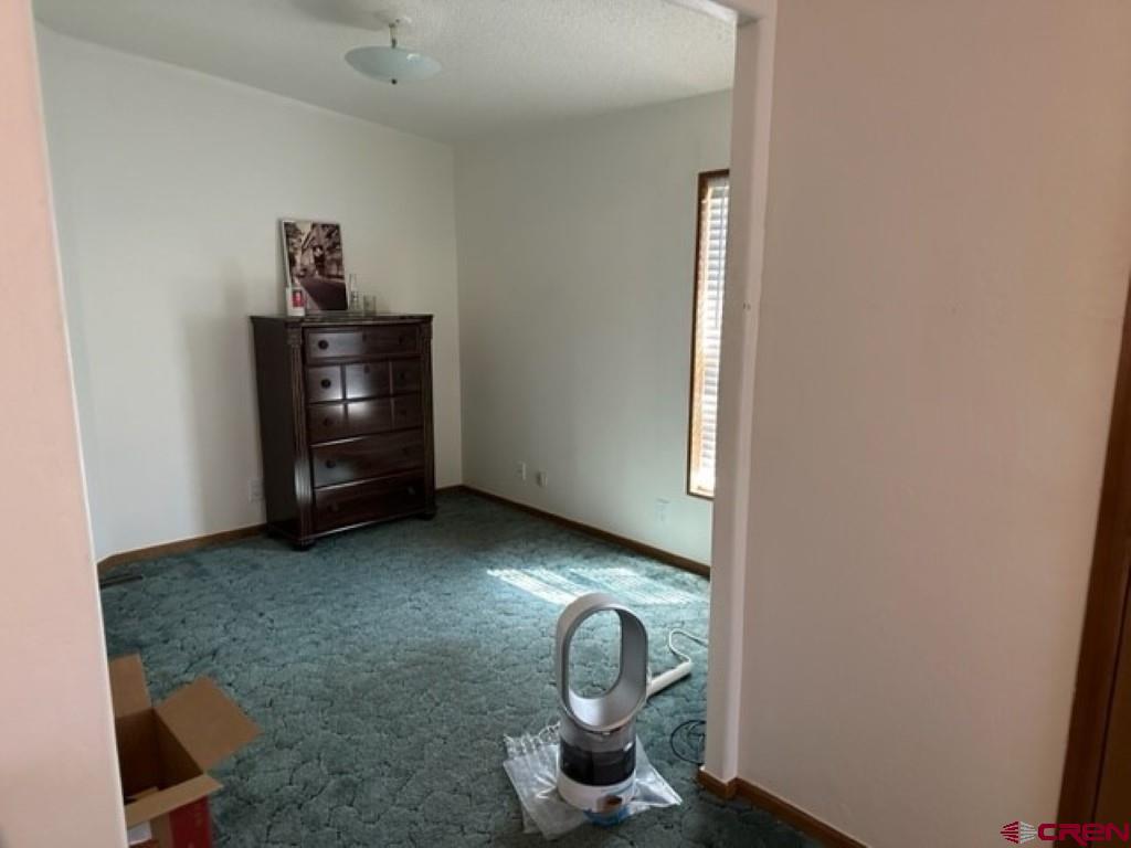 32 Hidden Lane Durango, CO 81303 - Photo 15 of 26 a view of a livingroom with furniture and window