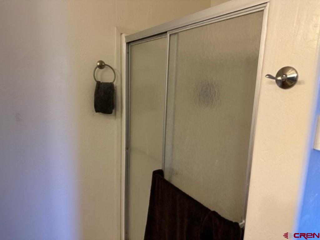 32 Hidden Lane Durango, CO 81303 - Photo 17 of 26 a bathroom with a shower and sink